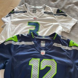 Two Seahawks jerseys. Size large.
